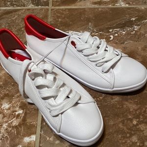 Red and white Nautica shoes in a size 10 in women’s.
